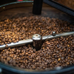 mixing-and-roasting-brown-coffee-beans-on-cooling-4ZTRNB9-compressed-cropped.jpg